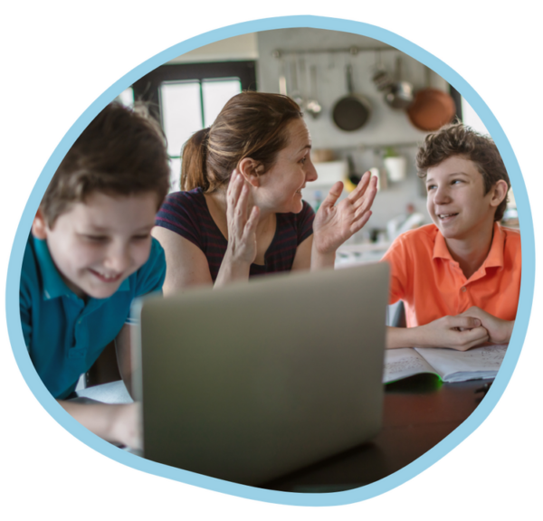 Homeschooling mum teaching two young sons at home